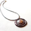 Pendentif artistique rond rose fonce verre de Murano